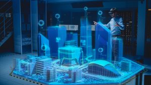 BIM模型全息图在浅蓝色,人与虚拟现实眼镜,指着背景墙与银行的计算机与琥珀色灯